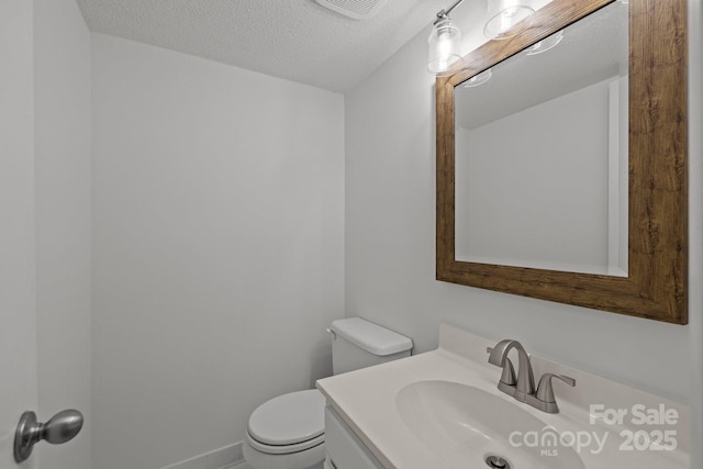 906 Wishing Well Ln, Charlotte, NC 28270 - half bath featuring vanity and a textured ceiling