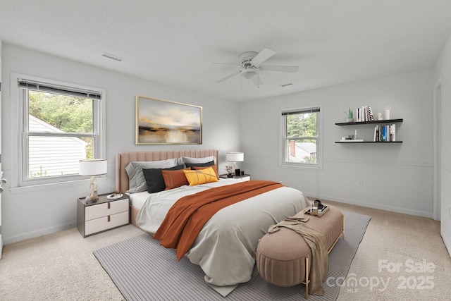906 Wishing Well Ln, Charlotte, NC 28270 - carpeted bedroom with baseboards and ceiling fan