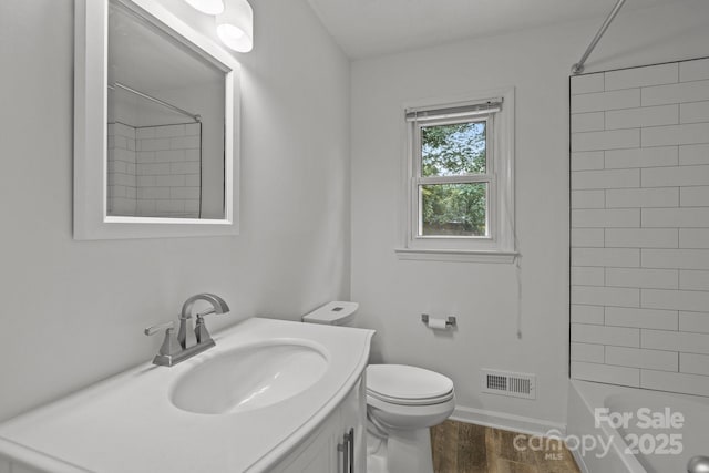 906 Wishing Well Ln, Charlotte, NC 28270 - bathroom with vanity, wood finished floors, and washtub / shower combination