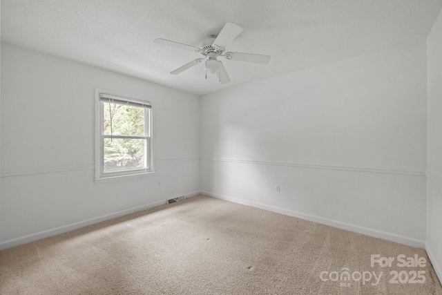 906 Wishing Well Ln, Charlotte, NC 28270 - spare room with carpet floors and a ceiling fan
