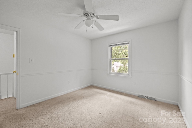 906 Wishing Well Ln, Charlotte, NC 28270 - carpeted spare room with a ceiling fan and a textured ceiling