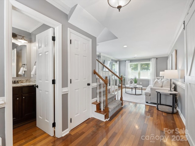 9908 Park Springs Ct, Charlotte, NC 28210 - hall with stairs, dark wood-type flooring, and crown molding