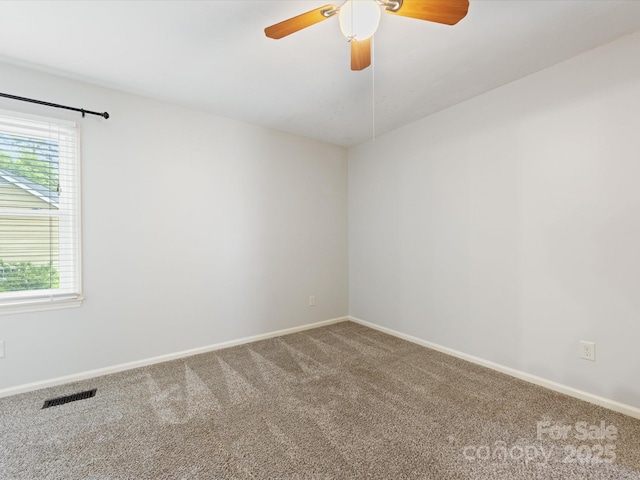 9908 Park Springs Ct, Charlotte, NC 28210 - carpeted spare room featuring baseboards and a ceiling fan