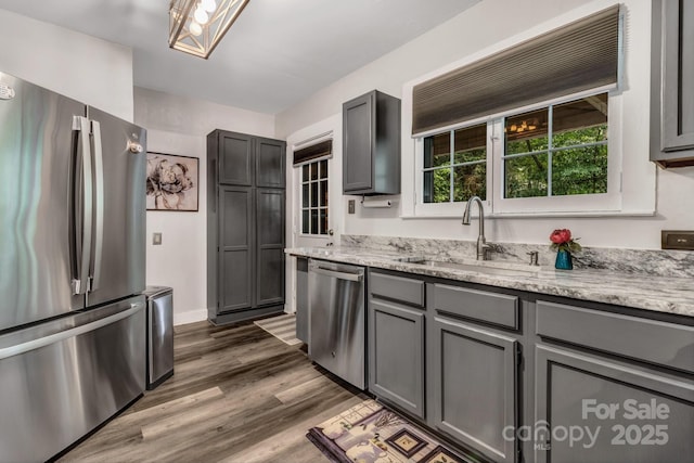 60 Meeks Rd, Black Mountain, NC 28711 - kitchen with appliances with stainless steel finishes, gray cabinets, dark wood finished floors, and light stone countertops