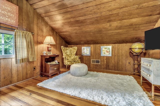 60 Meeks Rd, Black Mountain, NC 28711 - sitting room with wooden ceiling, vaulted ceiling, wood finished floors, and wood walls