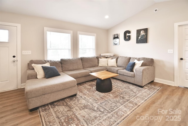 339 Brown Rd, China Grove, NC 28023 - living area with light wood-type flooring, healthy amount of natural light, lofted ceiling, and recessed lighting