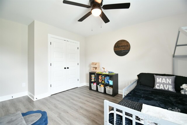 339 Brown Rd, China Grove, NC 28023 - bedroom featuring wood finished floors, a closet, and a ceiling fan