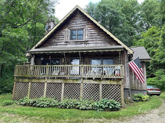 687 Willow Creek Rd, Leicester, NC 28748 - view of front of house featuring a porch and a chimney