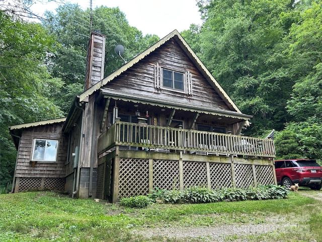 687 Willow Creek Rd, Leicester, NC 28748 - view of front of home with a chimney and a deck