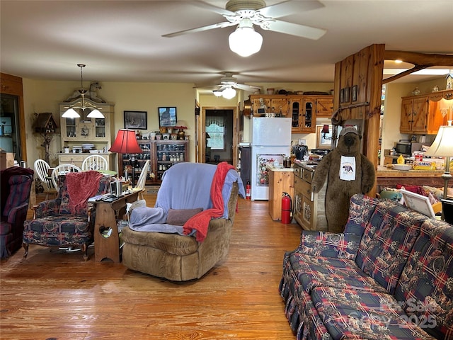 687 Willow Creek Rd, Leicester, NC 28748 - living area featuring light wood-style flooring and a ceiling fan
