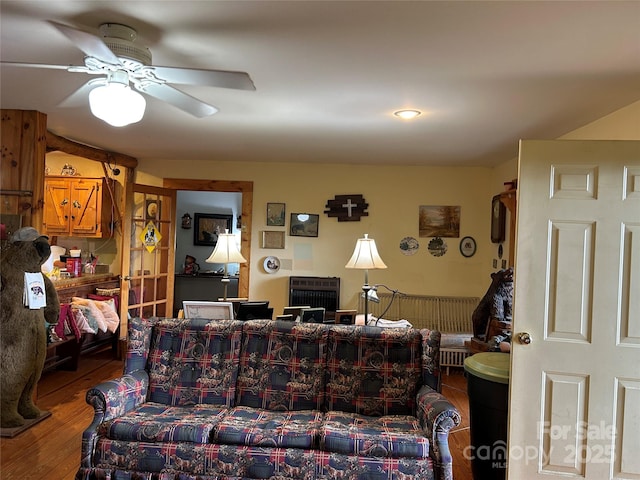 687 Willow Creek Rd, Leicester, NC 28748 - living area with wood finished floors and a ceiling fan