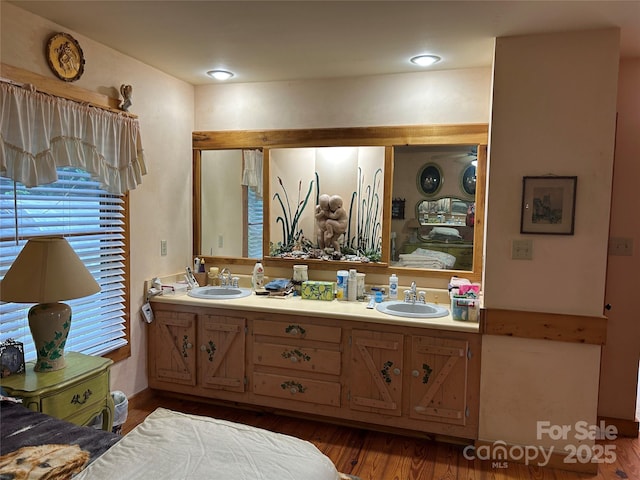 687 Willow Creek Rd, Leicester, NC 28748 - bathroom featuring double vanity and wood finished floors