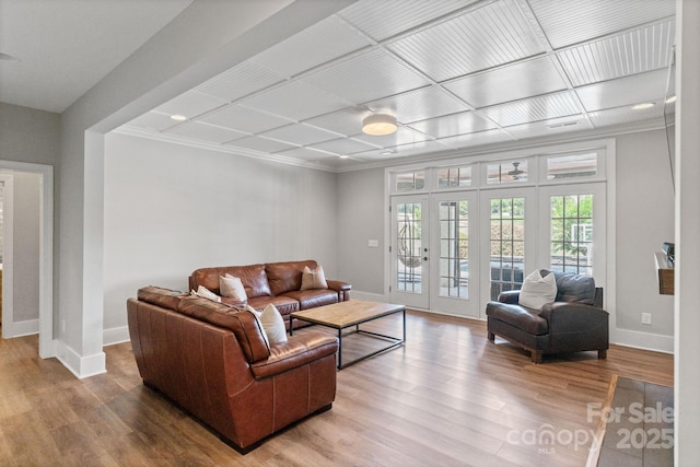 1032 Spyglass Ln, Waxhaw, NC 28173 - living area with crown molding, wood finished floors, and coffered ceiling