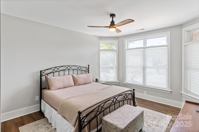 1032 Spyglass Ln, Waxhaw, NC 28173 - bedroom with dark wood-type flooring and ceiling fan