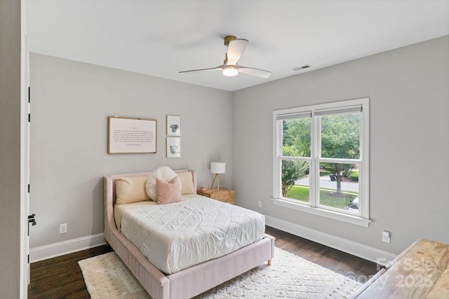 1032 Spyglass Ln, Waxhaw, NC 28173 - bedroom with dark wood finished floors and ceiling fan