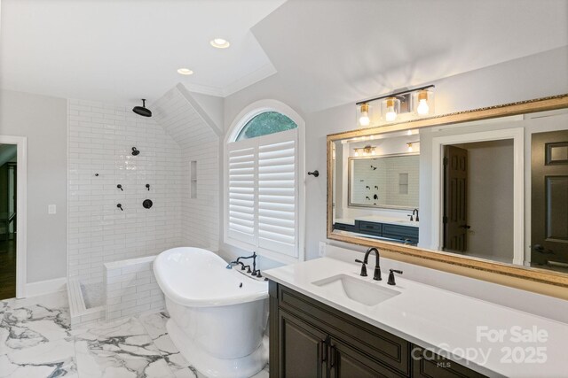 1032 Spyglass Ln, Waxhaw, NC 28173 - full bath featuring a walk in shower, a soaking tub, vanity, marble finish flooring, and recessed lighting