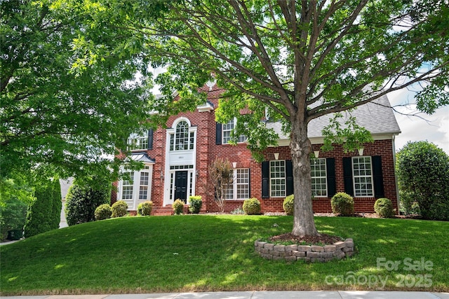 6803 Augustine Way, Charlotte, NC 28270 - georgian-style home with brick siding and a front lawn