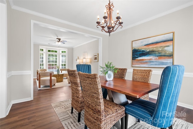 6803 Augustine Way, Charlotte, NC 28270 - dining room with dark wood finished floors, a chandelier, ornamental molding, and ceiling fan