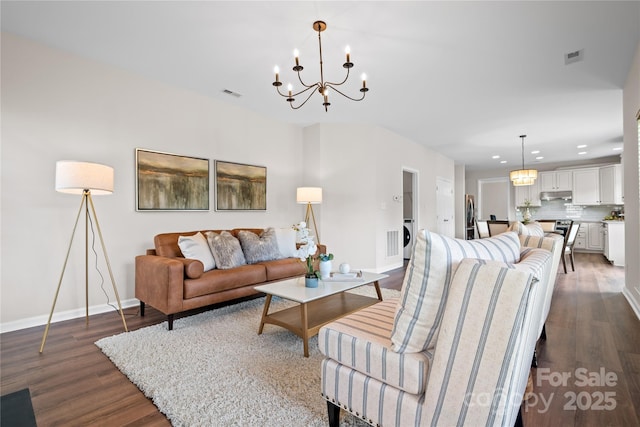 6803 Augustine Way, Charlotte, NC 28270 - living area featuring a chandelier, dark wood-type flooring, and recessed lighting