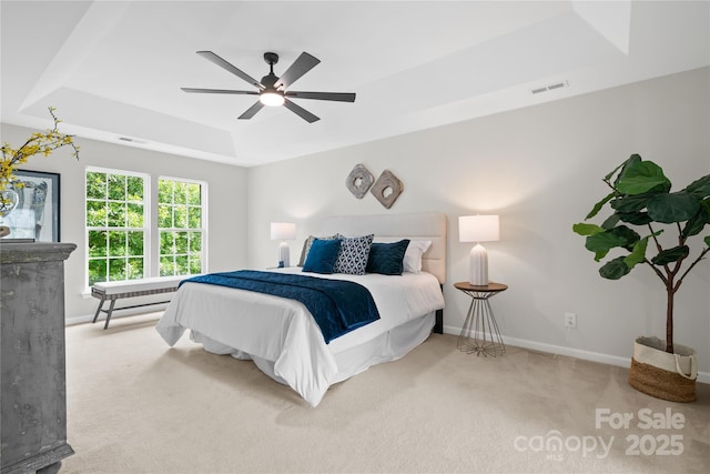 6803 Augustine Way, Charlotte, NC 28270 - bedroom featuring a tray ceiling, carpet, and a ceiling fan