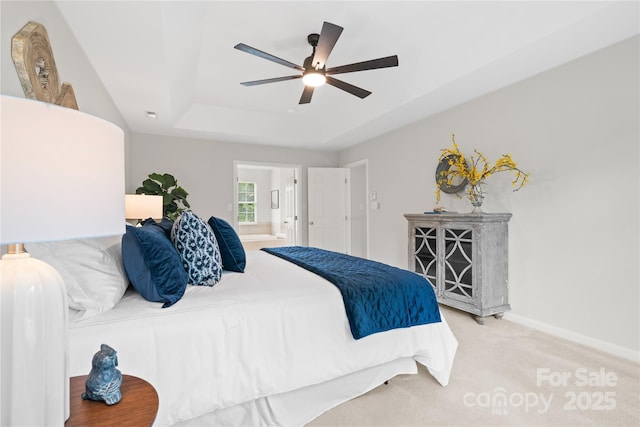 6803 Augustine Way, Charlotte, NC 28270 - bedroom with a tray ceiling, carpet floors, ensuite bath, and ceiling fan