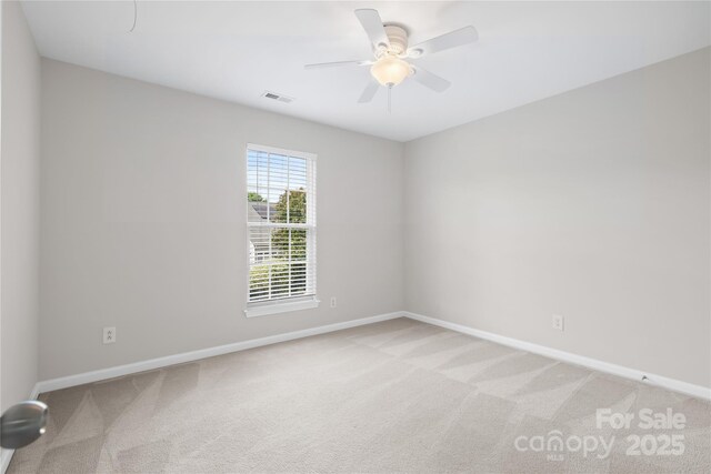 6803 Augustine Way, Charlotte, NC 28270 - spare room featuring light colored carpet and a ceiling fan