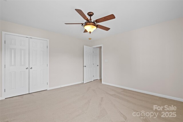 6803 Augustine Way, Charlotte, NC 28270 - unfurnished bedroom featuring carpet floors, a closet, and a ceiling fan