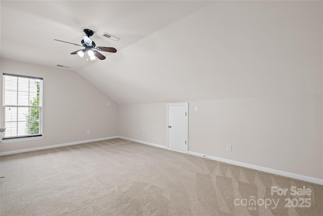 6803 Augustine Way, Charlotte, NC 28270 - additional living space featuring ceiling fan, light colored carpet, and lofted ceiling