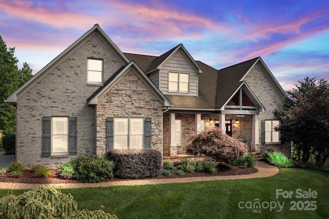 753 River Bend Dr, Granite Falls, NC 28630 - view of front of house featuring a lawn, stone siding, and covered porch