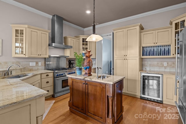 753 River Bend Dr, Granite Falls, NC 28630 - kitchen with cream cabinetry, wine cooler, wall chimney range hood, high end appliances, and light stone counters