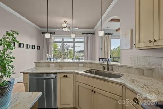 753 River Bend Dr, Granite Falls, NC 28630 - kitchen with stainless steel dishwasher, ornamental molding, cream cabinets, plenty of natural light, and light stone countertops