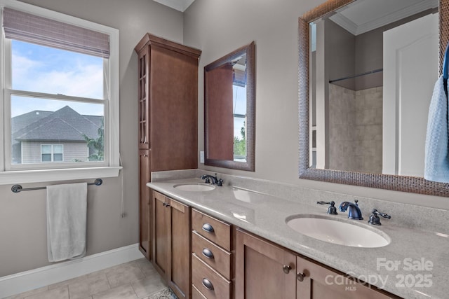 753 River Bend Dr, Granite Falls, NC 28630 - full bathroom featuring double vanity, plenty of natural light, tile patterned floors, ornamental molding, and a shower