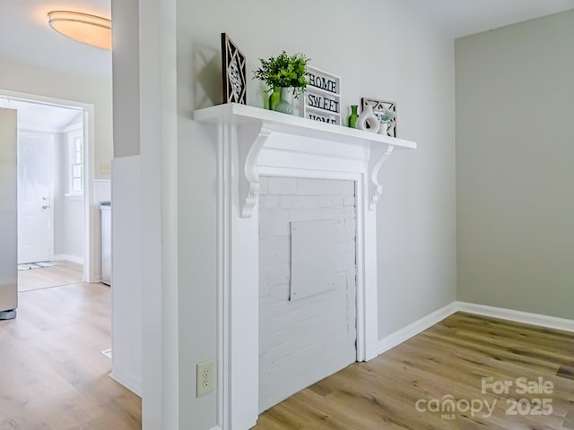 106 Cedar St, Spindale, NC 28160 - hallway with wood finished floors and baseboards