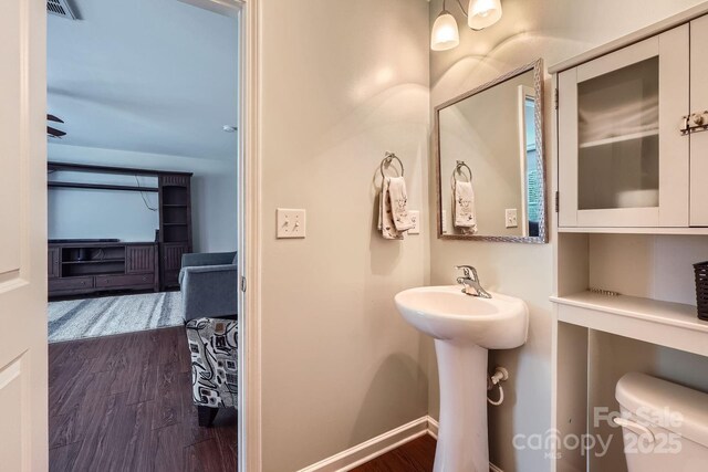 4151 Granite St, Midland, NC 28107 - bathroom with wood finished floors and baseboards