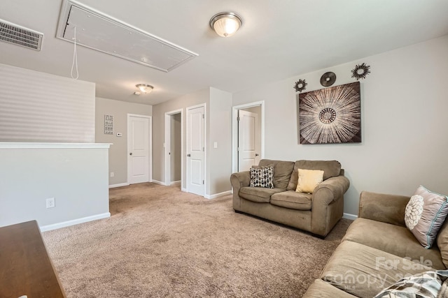 4151 Granite St, Midland, NC 28107 - carpeted living area featuring attic access and baseboards