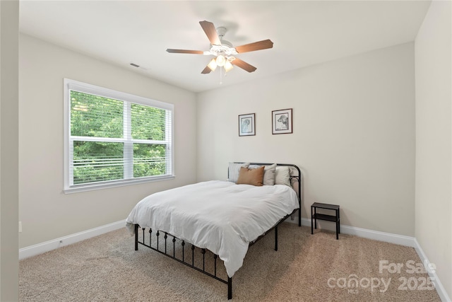 1830 Alden Oaks Ln, Charlotte, NC 28270 - carpeted bedroom featuring baseboards and ceiling fan
