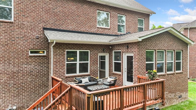 1830 Alden Oaks Ln, Charlotte, NC 28270 - back of property featuring a deck, brick siding, an outdoor living space, and a shingled roof