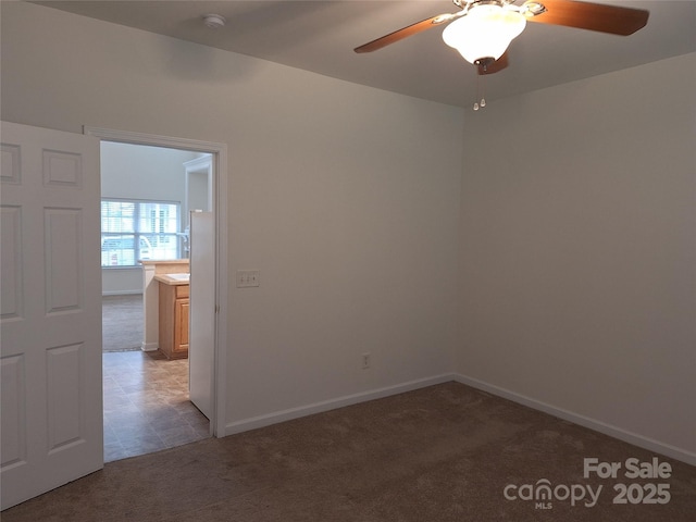 8838 Wandering Creek Way, Charlotte, NC 28227 - spare room featuring light colored carpet, ceiling fan, and a smoke detector