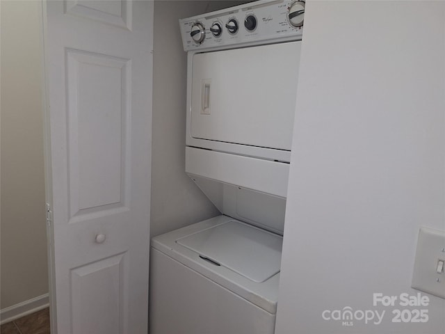 8838 Wandering Creek Way, Charlotte, NC 28227 - laundry area featuring stacked washer and clothes dryer