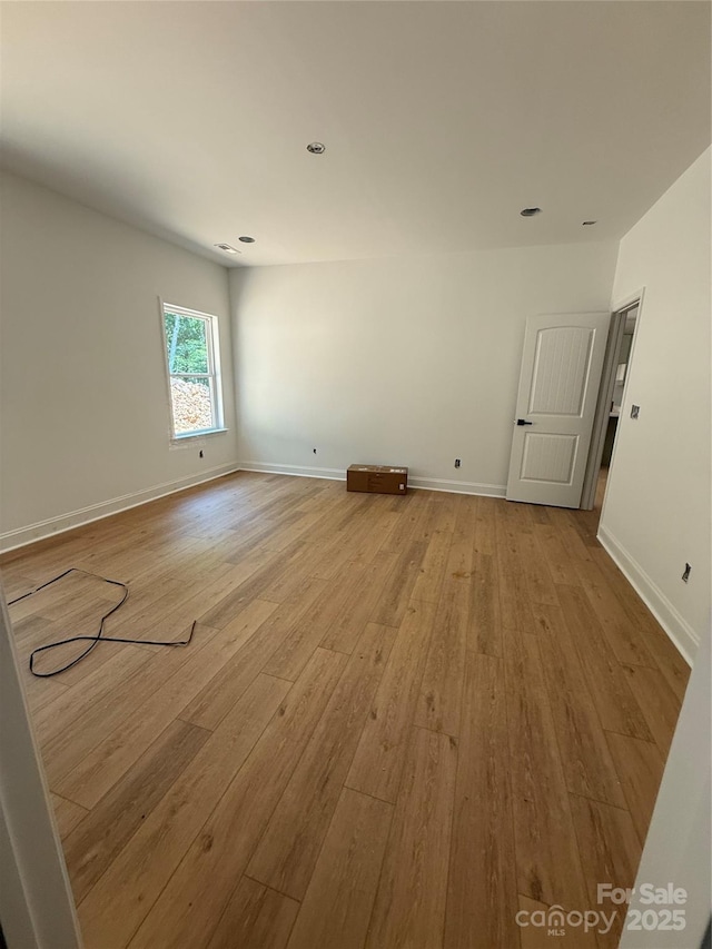 1923 Fairfield Rd, Mount Gilead, NC 27306 - spare room featuring light wood finished floors and recessed lighting