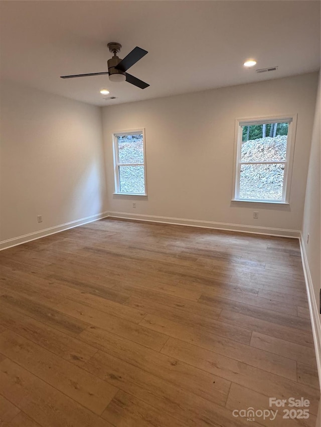 1923 Fairfield Rd, Mount Gilead, NC 27306 - unfurnished room with wood-type flooring, a ceiling fan, and recessed lighting