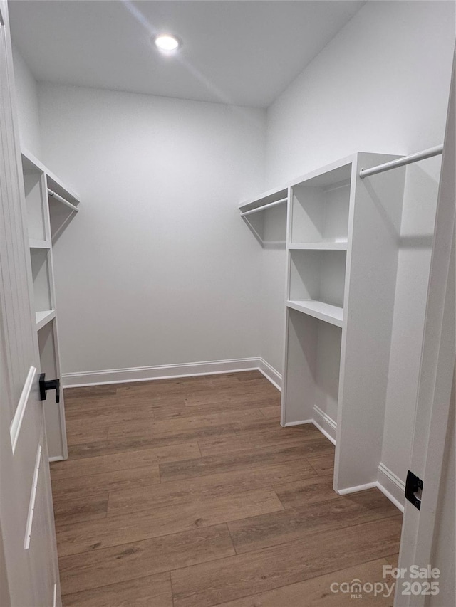 1923 Fairfield Rd, Mount Gilead, NC 27306 - spacious closet featuring wood finished floors