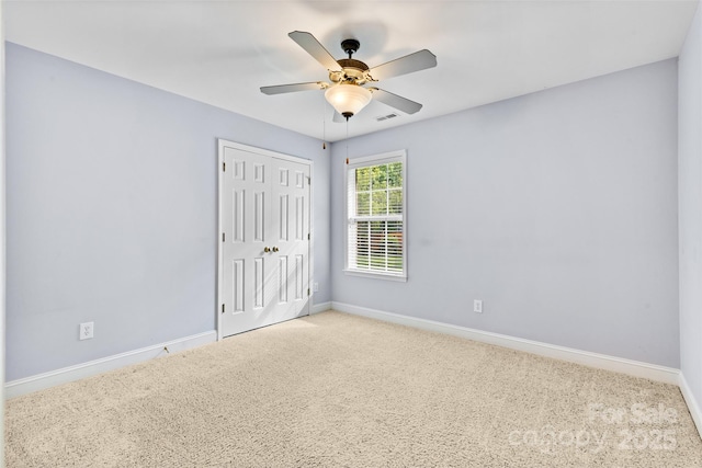 5707 Sustar Dr, Monroe, NC 28110 - unfurnished bedroom featuring carpet floors, a closet, and a ceiling fan