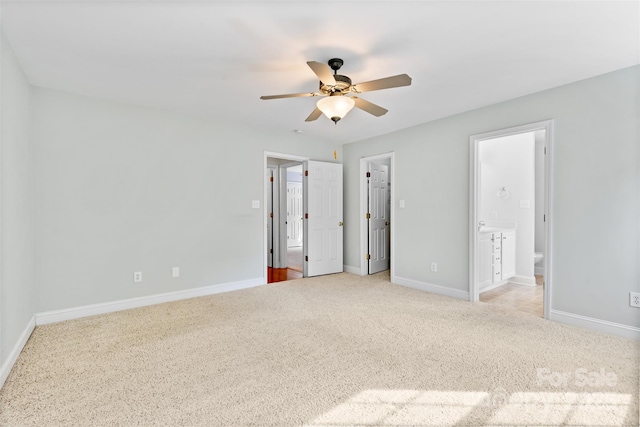 5707 Sustar Dr, Monroe, NC 28110 - unfurnished bedroom with light colored carpet, ensuite bath, and ceiling fan