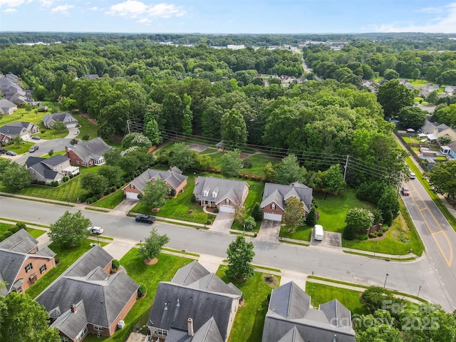 5707 Sustar Dr, Monroe, NC 28110 - aerial perspective of suburban area with a heavily wooded area