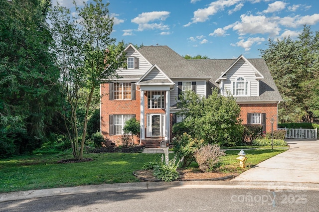 3500 Cedar Springs Dr SW, Concord, NC 28027 - view of front of house featuring brick siding, concrete driveway, and a shingled roof