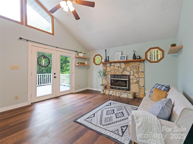 848 Eagles Ridge Rd, Sylva, NC 28779 - living area featuring ceiling fan, french doors, wood finished floors, a fireplace, and baseboards