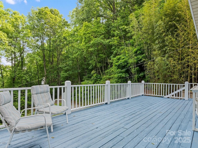 848 Eagles Ridge Rd, Sylva, NC 28779 - wooden terrace featuring a forest view