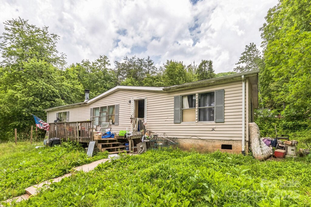 54 Lemon Creek Dr, Candler, NC 28715 - manufactured / mobile home featuring crawl space and a deck