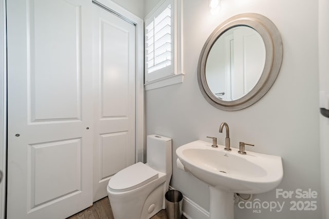 2004 Viscount Dr, Matthews, NC 28104 - bathroom featuring a sink and wood finished floors